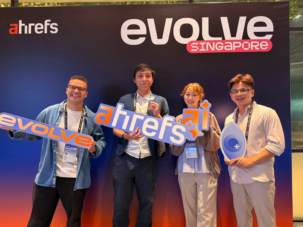 Ahrefs × Evolve backdrop · brand activation